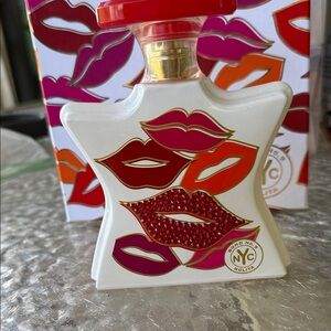 Bond No. 9 New York NOLITA has red rhinestones on box and bottle. No lipstick.